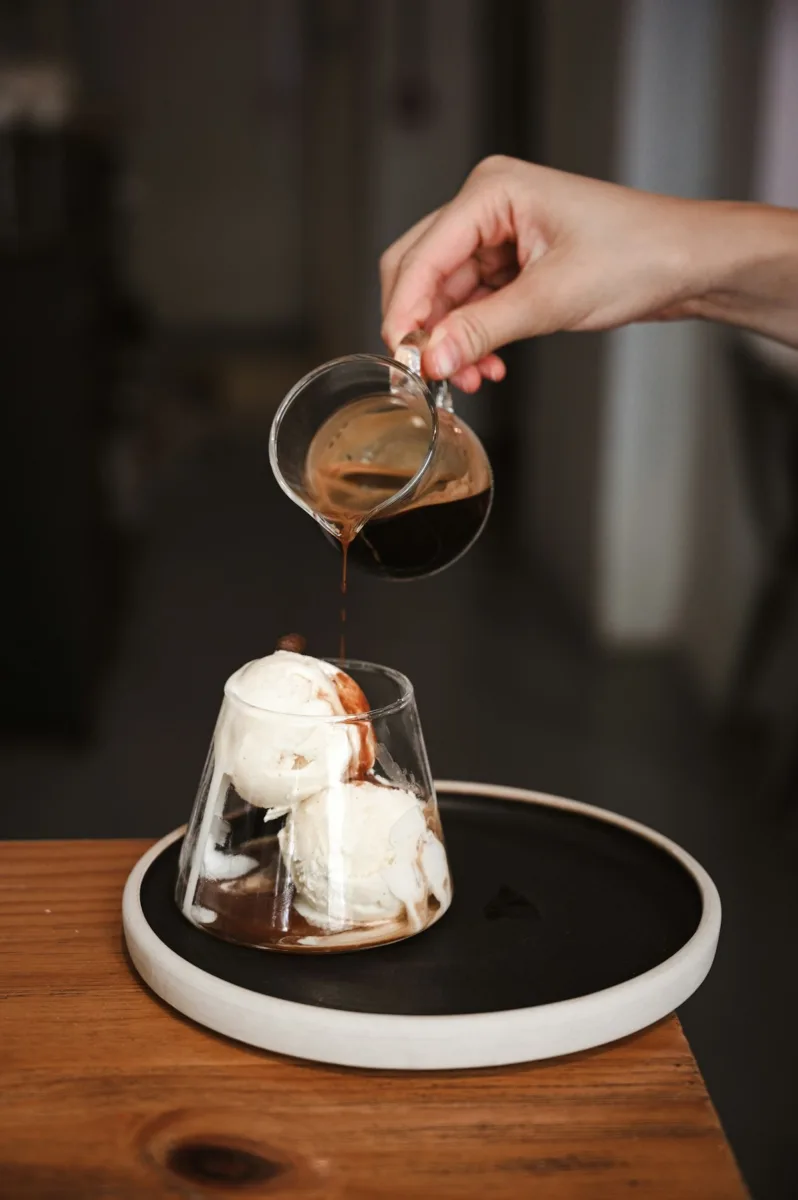 Affogato espresso poured over ice cream