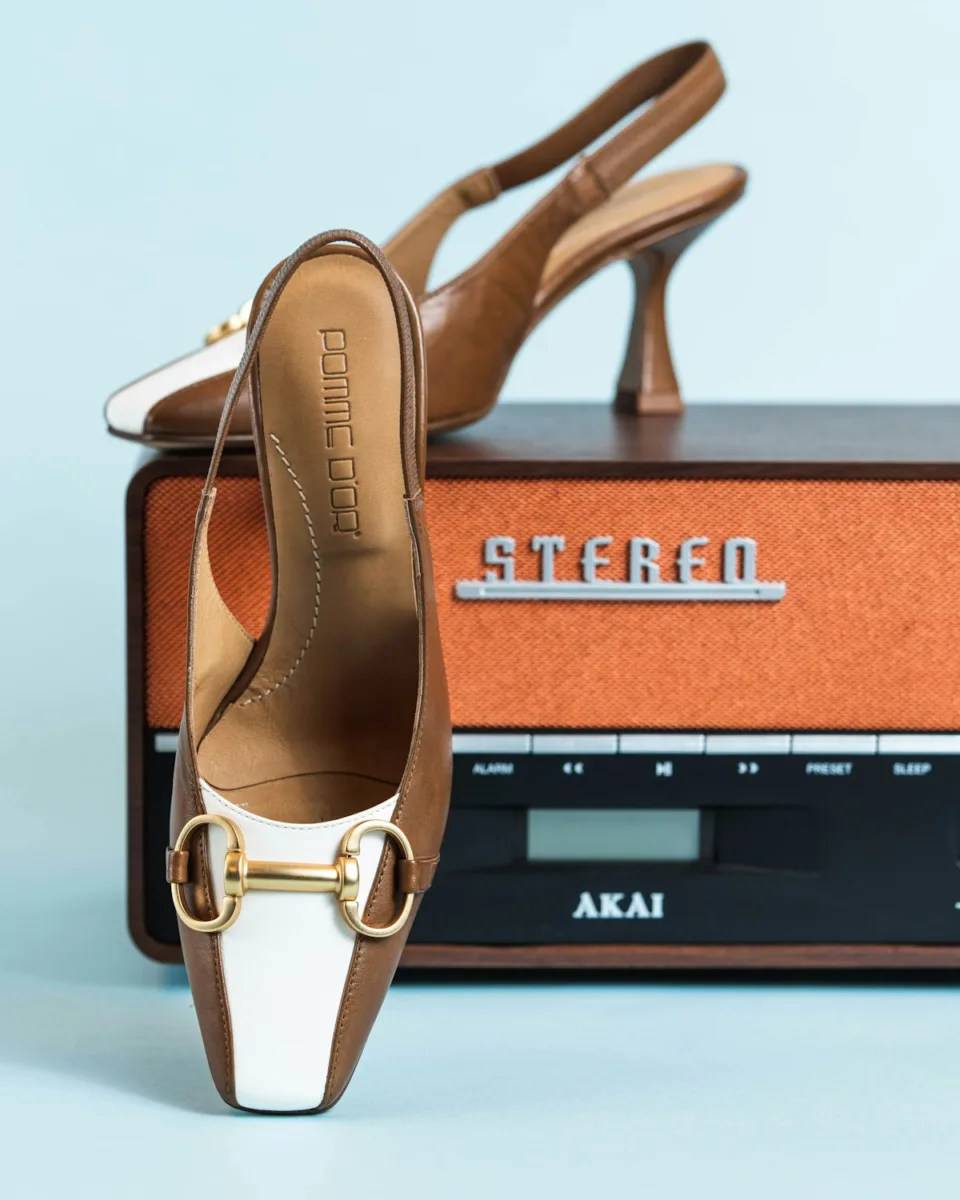 Beige slingback heel with a strap behind the ankle