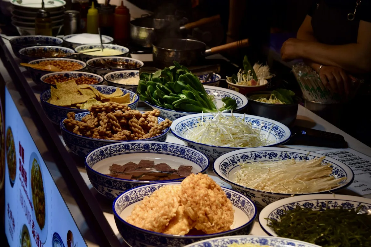 Different types of noodle dishes in bowls