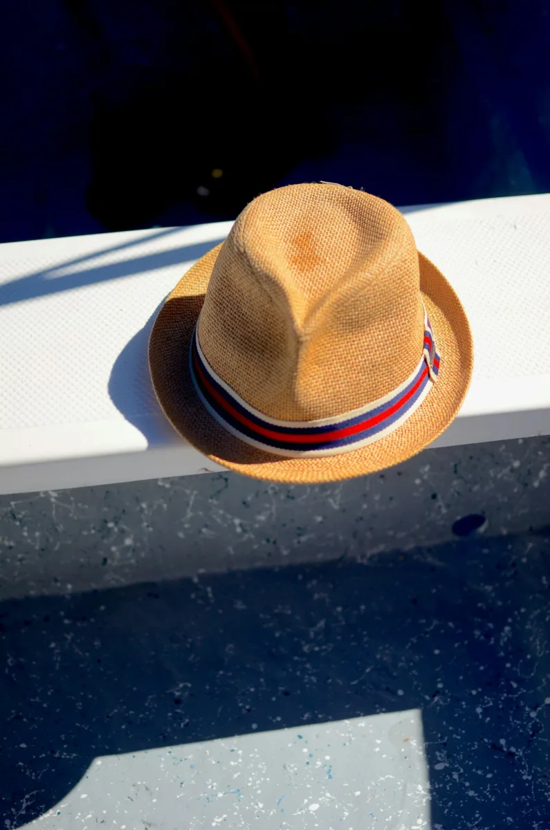 Fedora hat with a pinched crown and ribbon band
