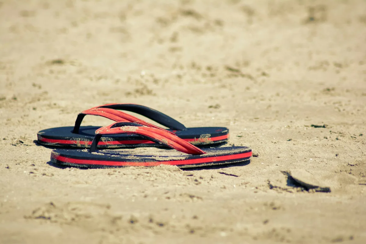 Flip flops on the sand