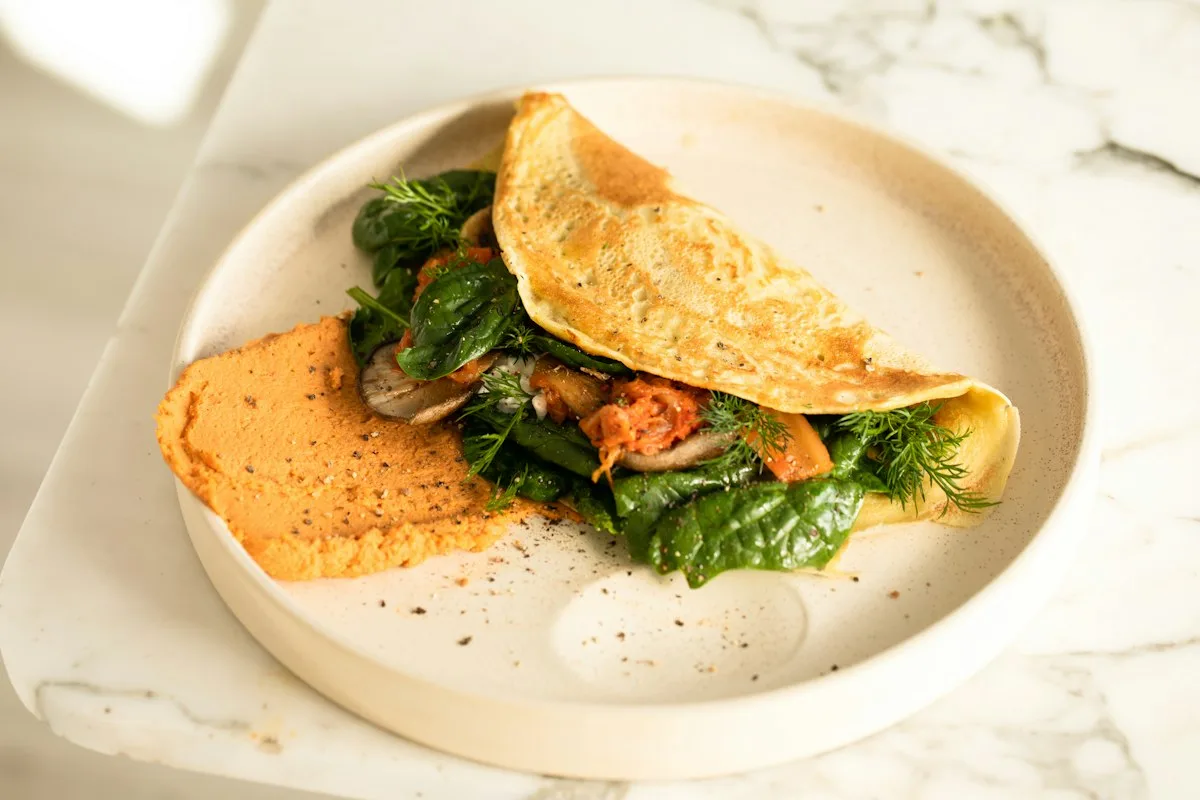 Folded omelet with greens