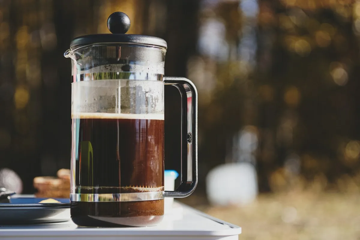 French press coffee maker on a table