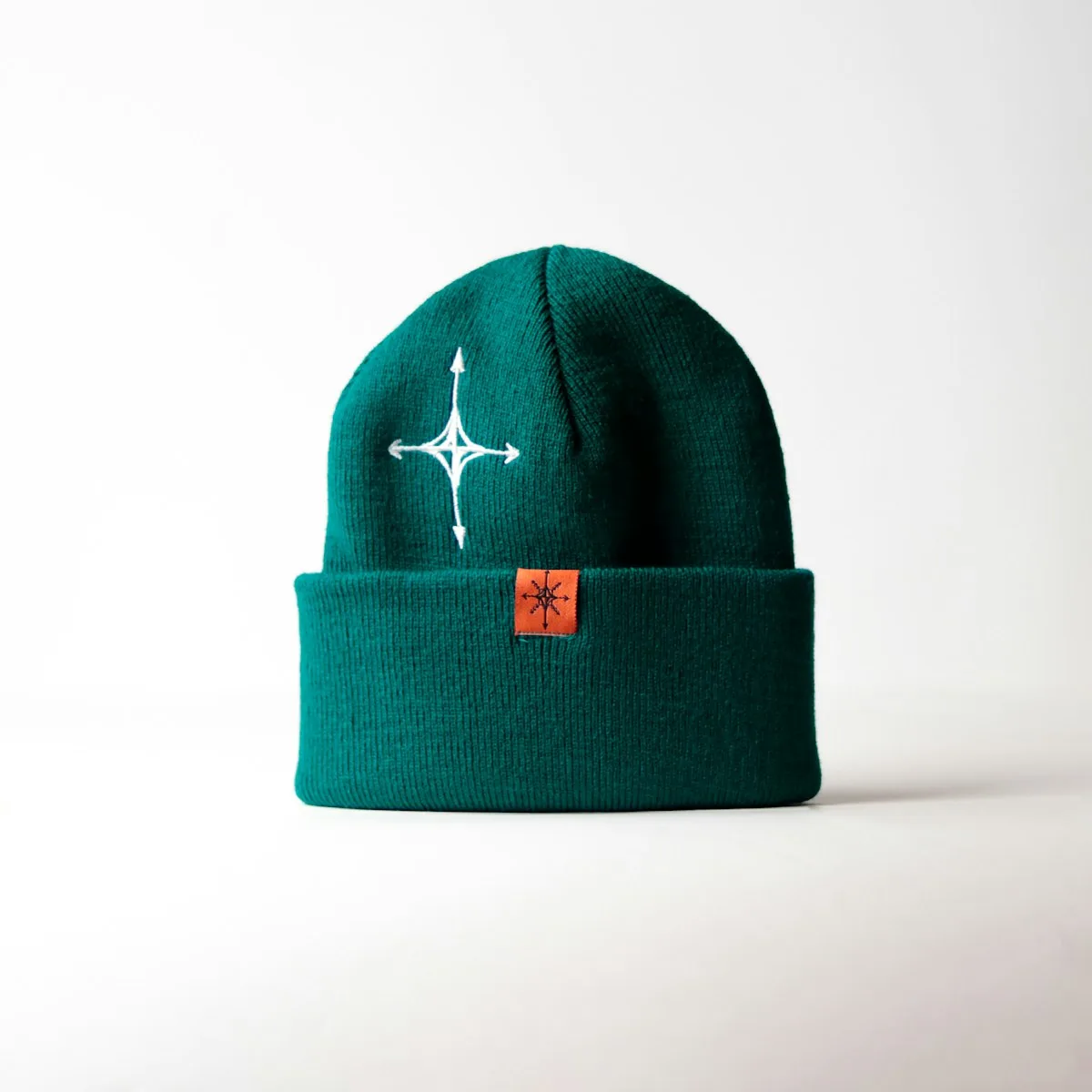 Green knitted beanie hat