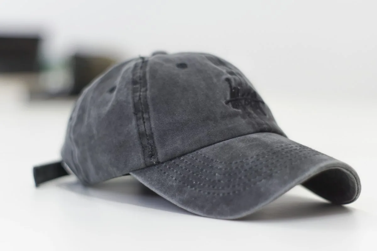 Grey baseball cap with a curved brim