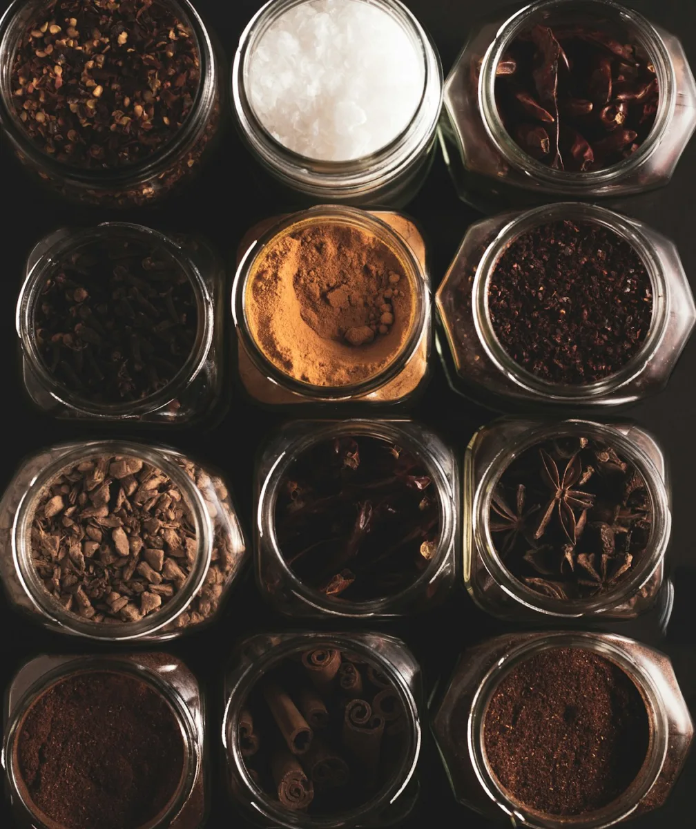 Jars of herbs and spices in a kitchen