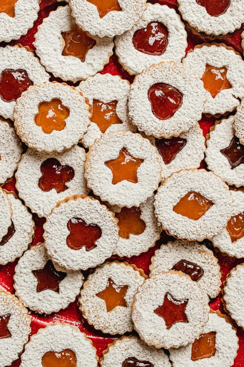 Linzer cookies with star cutouts and jam
