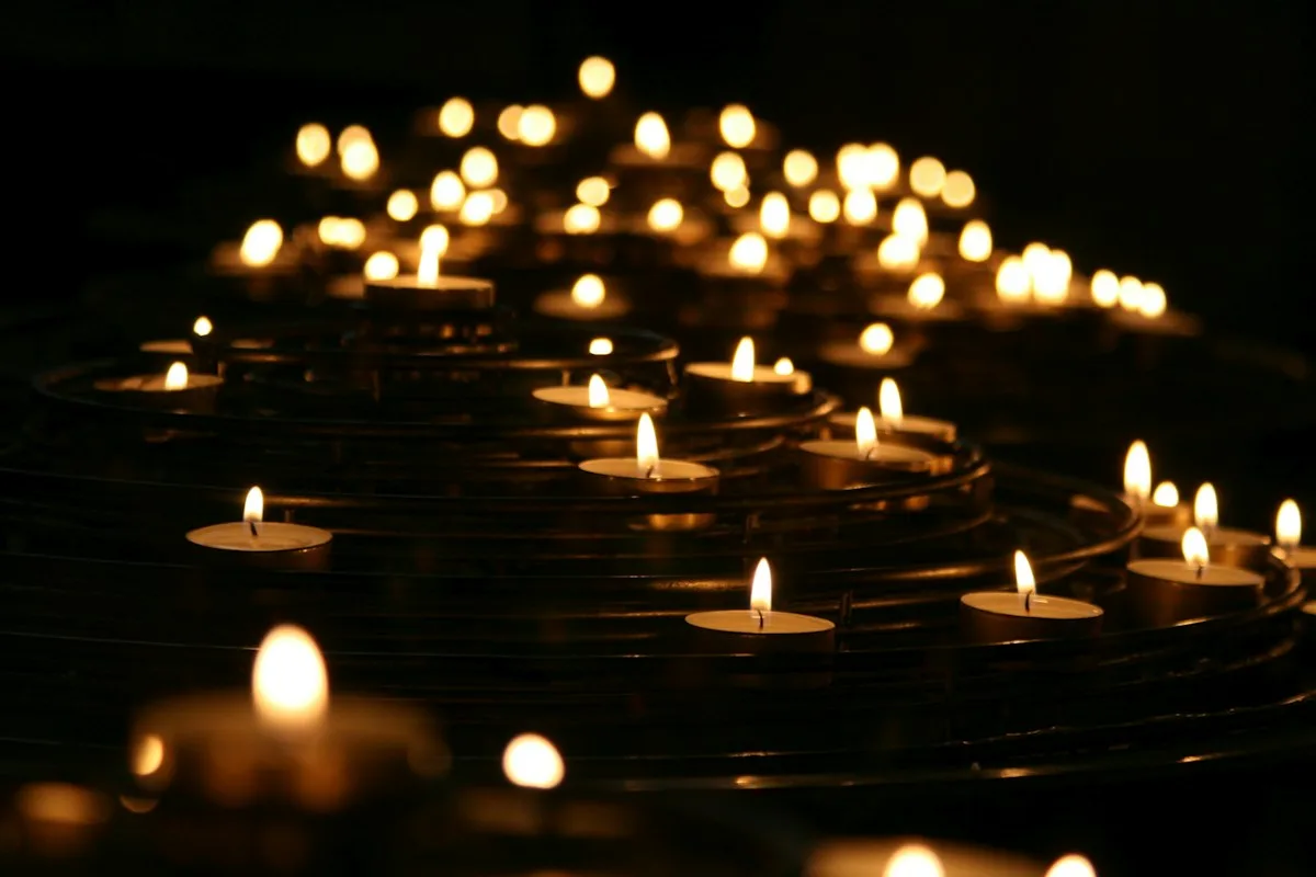 Lit candles arranged for a ritual