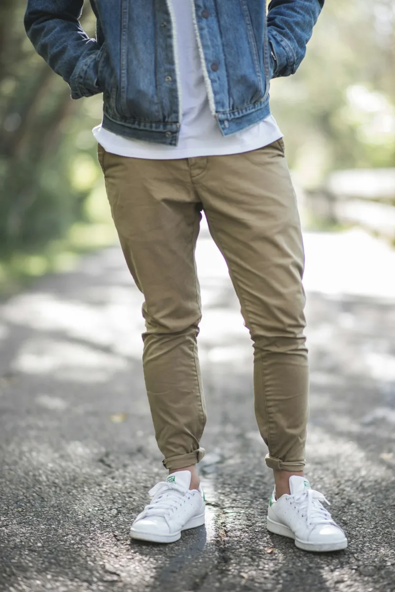 Man wearing khaki chino pants