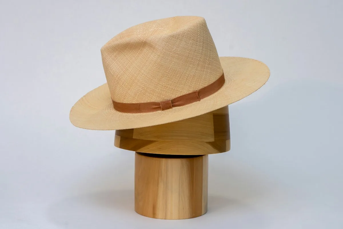 Panama hat woven from straw on a stand