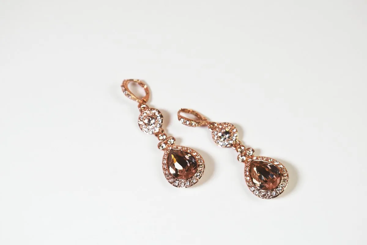 Rose gold dangle earrings with crystals