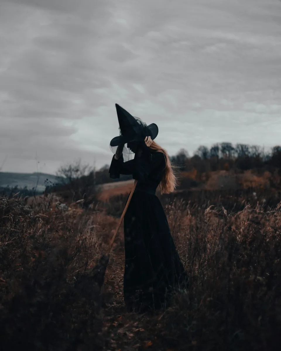 Silhouette of a witch in a pointed hat