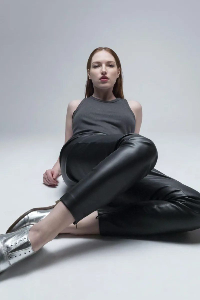 Woman wearing black leather pants