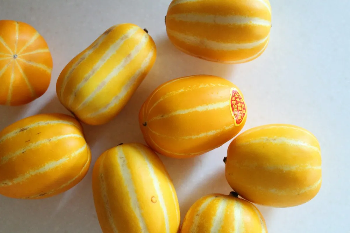 Yellow Korean melons with white stripes
